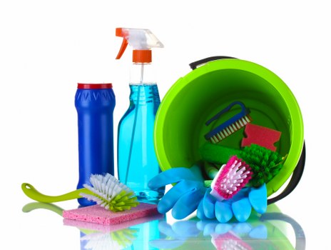 Deep cleaning living space with dusting and vacuuming