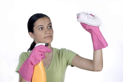 Cleaning surfaces after building work in a modern kitchen