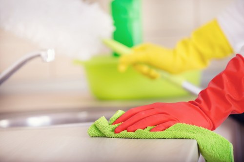 Local Acton cleaner preparing a bright kitchen for cleaning